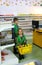 Children with shopping baskets in the supermarket