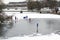 Children skate on the frozen lake