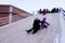 Children skate with a specially wrapped up hill