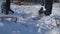 Children Sled on a Snow-covered Slide