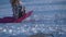 Children Sled on a Snow-covered Slide