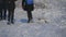 Children Sled on a Snow-covered Slide