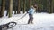 Children sledding on snow. Active fun for family Christmas vacation
