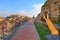 Children slide on playground in small town in Italy.