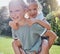 Children, smile and sister piggy back girl outdoor being playful, happy or relax together for summer holiday. Siblings