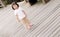 Children stand on the wood ground