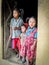 Children Standing in Doorway