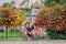 Children standing in front of flower pots in the town of Chatillon sur Seine