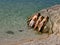 Children sunbathing at sea