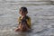 Children swimming in Saigon river