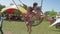 Children on swing, couple of joyful kids have fun laughing and amusement rides an park during holiday on summer vacation
