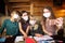 Children takes pictures wearing masks locked in their homes by a coronavirus pandemic