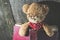 Children teddy bear with book