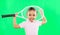 Children, tennis and a girl on a green screen background in studio for sports, recreation or fun. Portrait, kids and