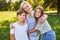 Children with their mother in happy embrace