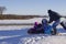 Children tobogganing in front lawn