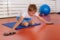 Children training with exercise gliders, improving balance and coordination skills