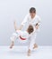 Children are training judo throws