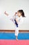 Children during training in karate. Fighting position