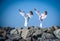 Children training karate on the stone coast