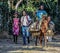 Children travel on foot and horse in rural Haiti.