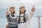 Children travelling in warm wool sweaters and winter hats