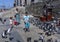 Children try to catch pigeons in Istanbul.