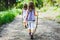 Children - twin girls are hiking in the mountains.