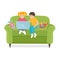 Children Use a laptop sitting on the couch.