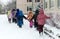 Children on walk in kindergarten in the winter.