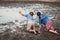 Children and water on arid soil in hot.