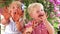 Children Waving Chocolate Covered Hands At Camera