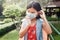 children wearing face protection in prevention for coronavirus during
