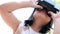 Children wearing virtual reality glasses with fun and surprising face standing outdoor