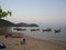 Children were waiting for his father at the beach. a Local Fisherman Village. Naiyang Beach, Phuket City, Thailand. May