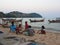 Children were waiting for his father at the beach. a Local Fisherman Village. Naiyang Beach, Phuket City, Thailand. May