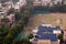 Children in white uniform playing on a cricket field powered by