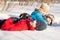 Children in winterwear playing in snowdrift