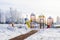 Children wood playground in park winter