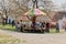 Children on wooden carousel
