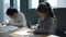 Children working with documents in the workplace, in a modern office