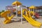 Childrens climbing frame and slide in tropical resort playground