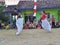 Childrens competiting in sack race. Celebration to welcome Independence day of Indonesia