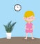 Childrens day, little boy with potted plant and clock