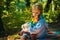 Childrens friendship. Atumn fun at the park. Happy kids autumn. Cute boy with Autumn Leaves on Fall Nature Background