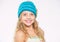 Childrens knitted hats. Girl long hair happy face white background. Kid wear warm soft knitted blue hat. Difference