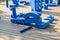 childrens playground in park with blue giant geometric figures f