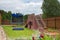 Childrens slide, trampoline and sandbox on the playground