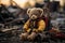 Childrens teddy bear symbolizing innocence and hope amidst war in ruined cityscape