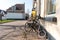 Childrens vintage penny farthing high wheel bicycle outside a dutch small town home on a street